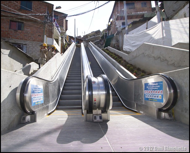 Up view of both sides of an outdoor escalator in Medellin, colombia