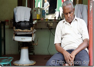 old hairdresser sleeping at work