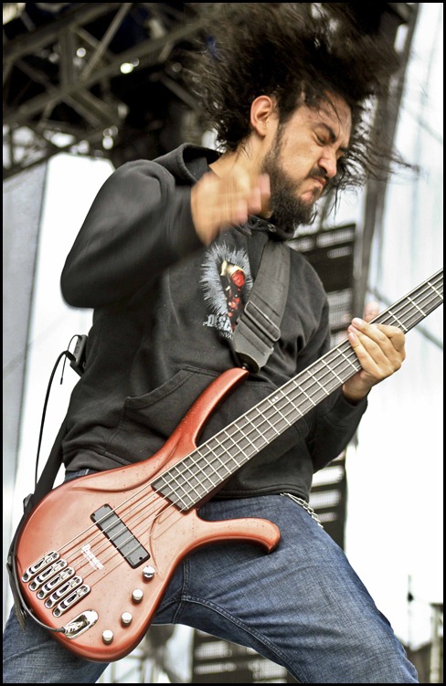 Miguel from Descomunal playing bass at Altavoz Festival 2011. Medellin, Colombia