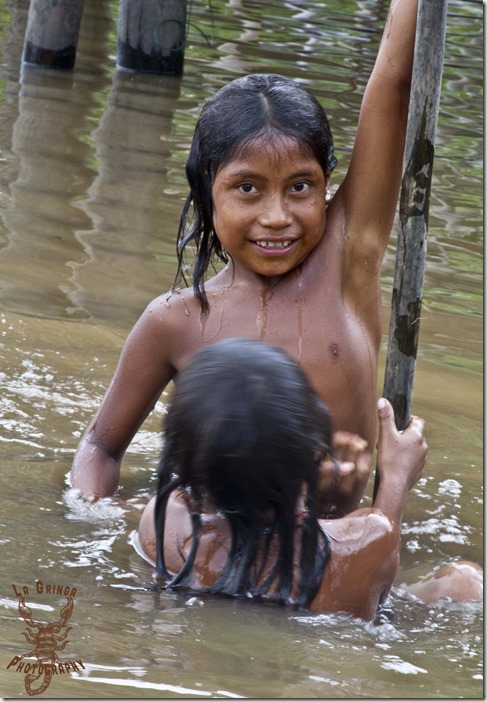 Warao boys playing in the Orinoco delta, water, boys playing in water, indigenous , natives playing, going nomadic, la gringa photos, 2 Warao boys, orinoco delta, venezuela